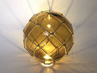 Tabletop LED Lighted Amber Japanese Glass Ball Fishing Float with Brown Netting Decoration 10"
