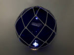 Tabletop LED Lighted Dark Blue Japanese Glass Ball Fishing Float with White Netting Decoration 10"