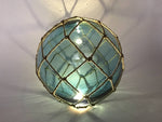 Tabletop LED Lighted Light Blue Japanese Glass Ball Fishing Float with Brown Netting Decoration 10"