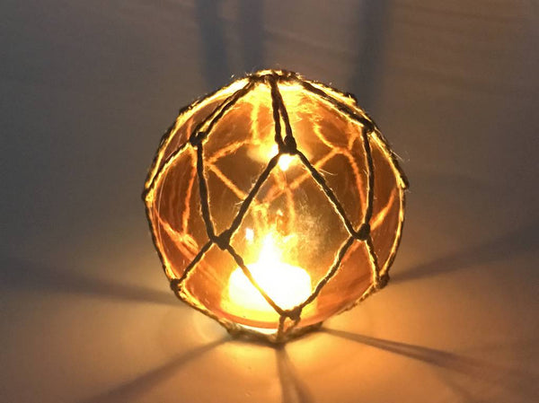 Tabletop LED Lighted Orange Japanese Glass Ball Fishing Float with Brown Netting Decoration 4"