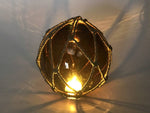 Tabletop LED Lighted Amber Japanese Glass Ball Fishing Float with Brown Netting Decoration 6"