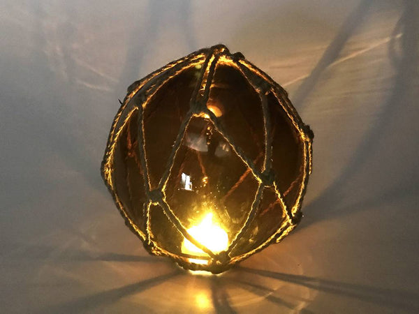 Tabletop LED Lighted Amber Japanese Glass Ball Fishing Float with Brown Netting Decoration 6"