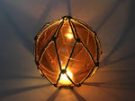 Tabletop LED Lighted Orange Japanese Glass Ball Fishing Float with Brown Netting Decoration 6"