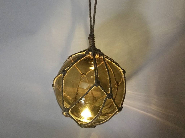 LED Lighted Amber Japanese Glass Ball Fishing Float with Brown Netting Decoration 10"